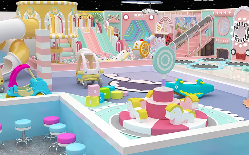 Colorful macaron and pastel-themed indoor playground with slides, ride-on toys, and interactive play zones, designed for toddlers and family-friendly spaces.