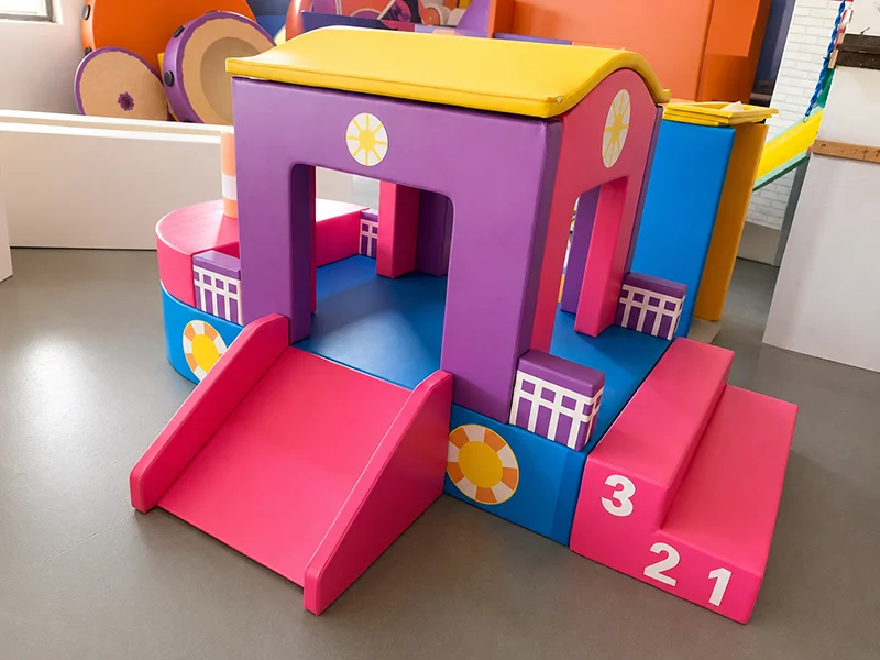 Soft play crawl and slide combination for toddlers aged 0–5, designed to develop crawling ability, sensory integration, and early motor skills in a safe indoor playground environment