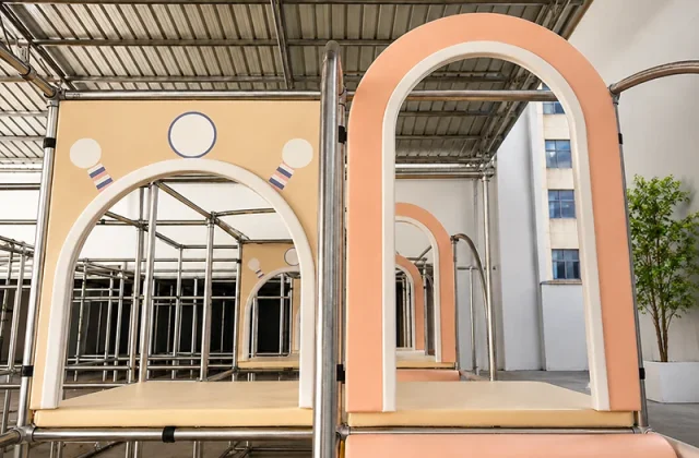 Playground equipment and accessories assembly after steel frame installation
